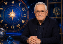 Prezentator astrologie într-un decor cu simboluri zodiacale