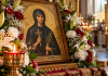 Alimentul despre care se spune că aduce ghinion pe 14 octombrie, de Sfânta Parascheva Icoană a Sfintei Parascheva, flori și lumânare, cu text despre credința populară legată de un aliment evitat pe 14 octombrie